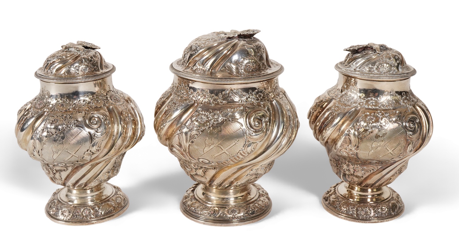 A pair of George II silver tea caddies and matching sugar box with covers, by Samuel Taylor